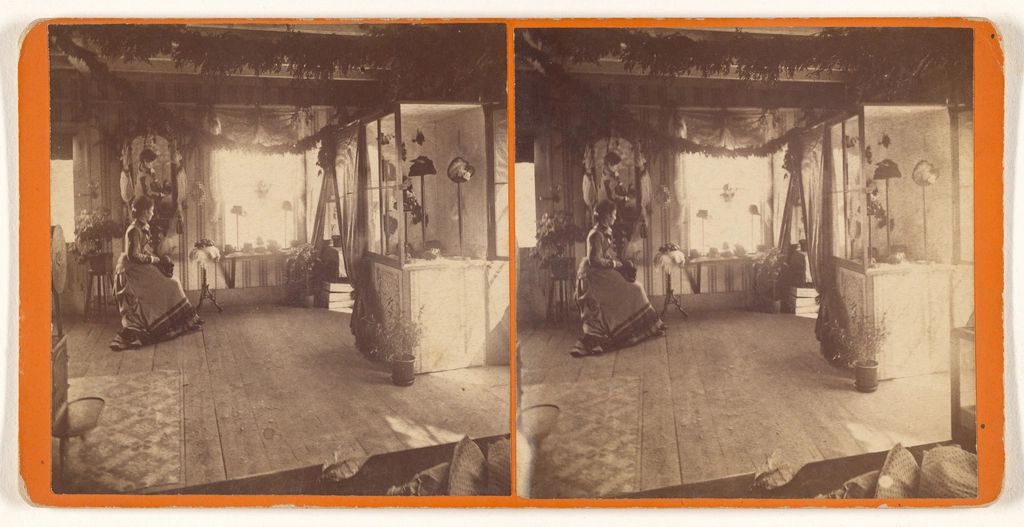 A guest room with two beds and a window